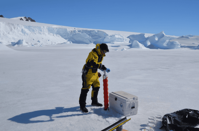 Taking samples from the ice