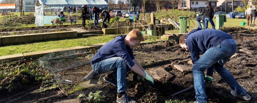 Vrijwilligers aan het werk tijdens NLdoet