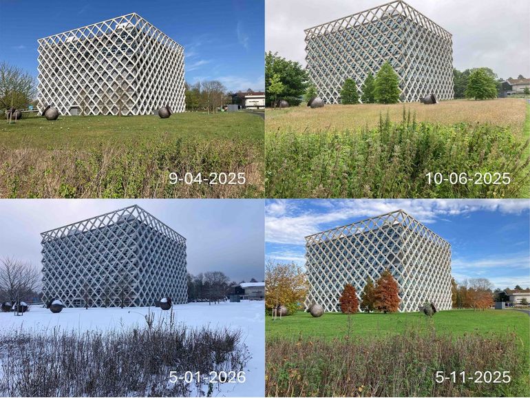 Het Atlasgebouw met ervoor het kunstwerk &lsquo;De dans van de spijspotten&rsquo;