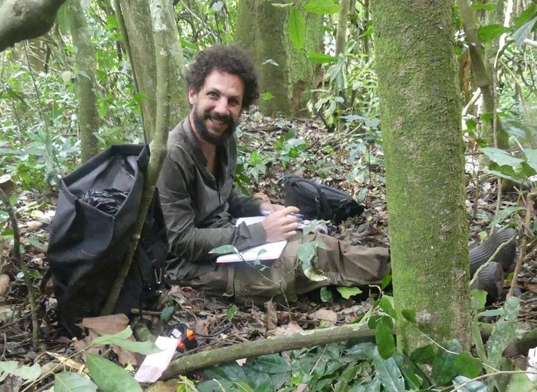 Toni Romani in a chimpanzee groundnest