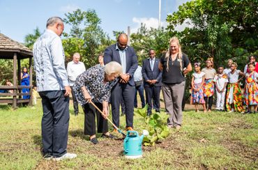 Planting a tree at Emilio Wilson Estate