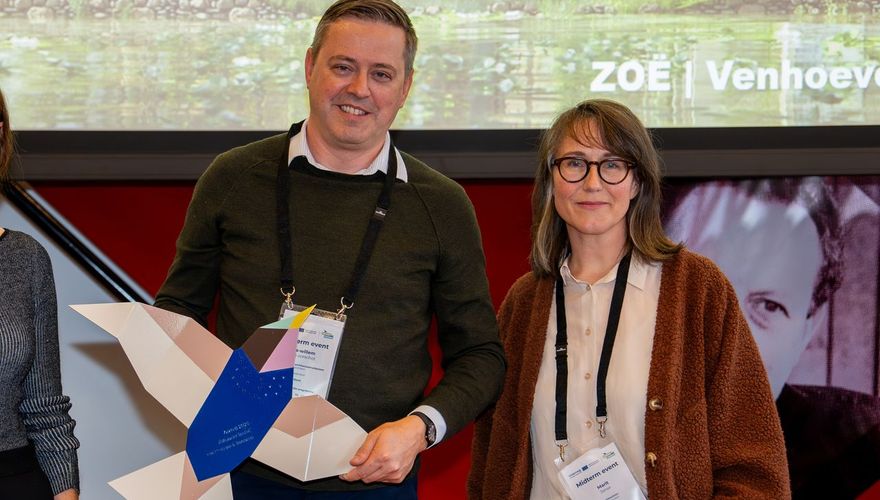 Jos-Willem van Oorschot van VenhoevenCS en juryvoorzitter Marit Janse / Foto: de Fotomeneer
